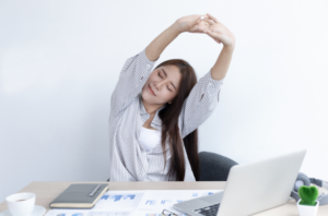 stretching at work desk